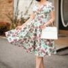 The Bombshell Flower Print Swing Dress In White -King Louie Shop 234475 Vintage Diva 45232 Swing Dress White Flowers 221227 510MW category