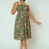 Waverly Strawberry Patch Swing Dress In Green 2 Waverly Strawberry Patch Swing Dress In Green -King Louie Shop 239168 Collectif 46389 Waverly Strawberry Patch Swing Dress 20230314 020LW category