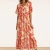 Patricia Floral Maxi Dress In Orange 2 Patricia Floral Maxi Dress In Orange -King Louie Shop 242182 Smashed Lemon 46432 Maxi Dress Flowers Orange 20230505 020L category