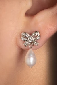 Freshwater Pearl And Bow Stud Earrings In Silver