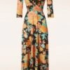Paola Cross Over Maxi Dress In Brown And Orange 1 Paola Cross Over Maxi Dress In Brown And Orange -King Louie Shop 243210 Vintage Chic 48188 Dress Maxi Flowers Brown Orange 230628 402W category