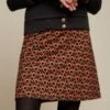 King Louie Border Quentin Skirt In Black -King Louie Shop 246060 King Louie 47005 Border Skirt Quentin Black Orange 230414 020LW category